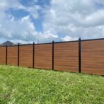 Vinyl Fence Privacy Panel Woodgrain Installed in Arkansas