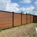 Vinyl Fence Woodgrain Privacy Panel Installed in Alabama